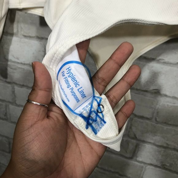 Ribbed Ivory Long Sleeve Henley Thong Bodysuit - Picture 6 of 11